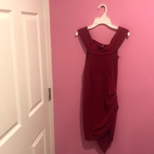 Tight, red dress. Best worn off the shoulders